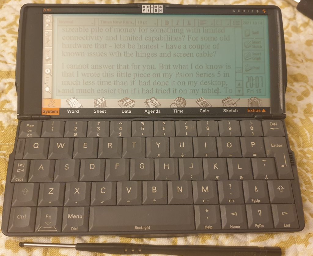 My Psion Series 5, with the stylus in front, displaying the draft of this blogpost
