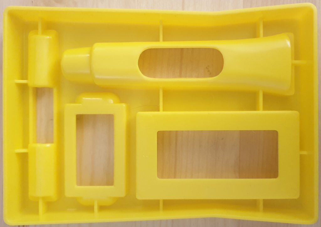 The underside of the plastic carrier for the airline Tech